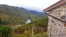 View through the valley to the mountains Pignona, Italy